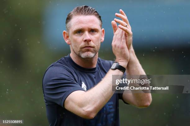 Andy Welsh, Manager of Bury FC applauds fans following the Pre-Season Friendly match between Bury FC and Bradford City at Gigg Lane on July 08, 2023...