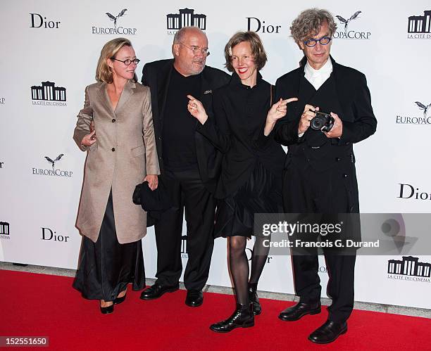 Peter Lindbergh, his wife Petra Lindbergh and Wim Wenders and his wife Donata Wenders attend 'La Cite Du Cinema' Launch on September 21, 2012 in...