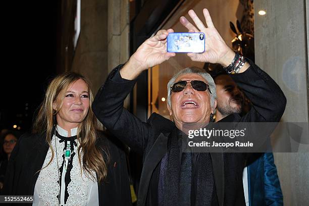 Eva Cavalli and Roberto Cavalli arrive at The new Just Cavalli Boutique Opening Party on September 21, 2012 in Milan, Italy.