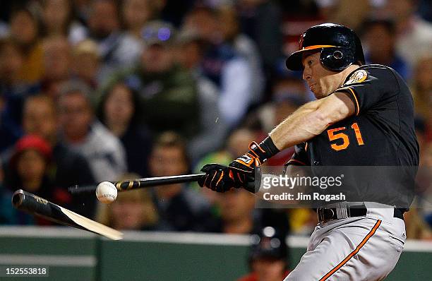 Lew Ford of the Baltimore Orioles shatters his bat fouling a ball in the fourth inning against the Boston Red Sox at Fenway Park on September 21,...