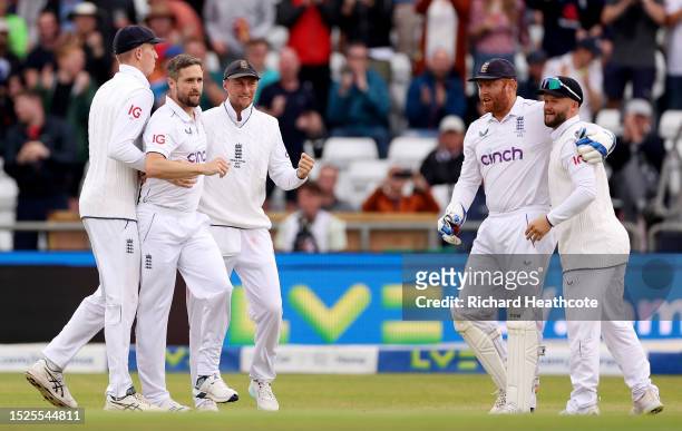 Chris Woakes of England celebrates with teammates after dismissing Mitchell Marsh of Australia during Day Three of the LV= Insurance Ashes 3rd Test...