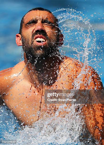 Adam Goodes of the Swans swims during a Sydney Swans recovery session at Sydney Cricket Ground on September 22, 2012 in Sydney, Australia.