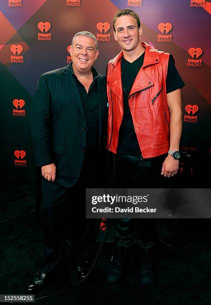 Radio host Elvis Duran and U.S. Olympian Ryan Lochte pose in the Elvis Duran Broadcast Room during the 2012 iHeartRadio Music Festival at the MGM...