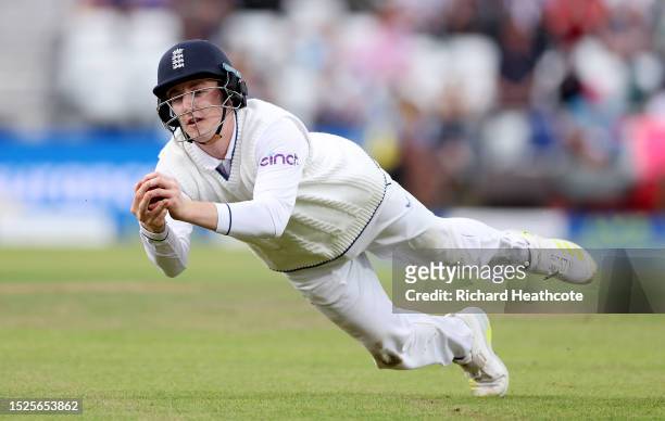 Harry Brook of England catches out Mitchell Starc of Australia during Day Three of the LV= Insurance Ashes 3rd Test Match between England and...