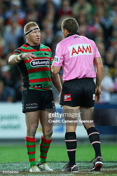 Rabbitohs captain Michael Crocker talks to referee Ben Cummins during the NRL Preliminary Final match between the Canterbury Bulldogs and the South...