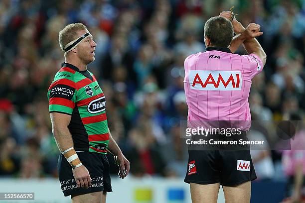 Rabbitohs captain Michael Crocker is placed on report by referee Ben Cummins during the NRL Preliminary Final match between the Canterbury Bulldogs...