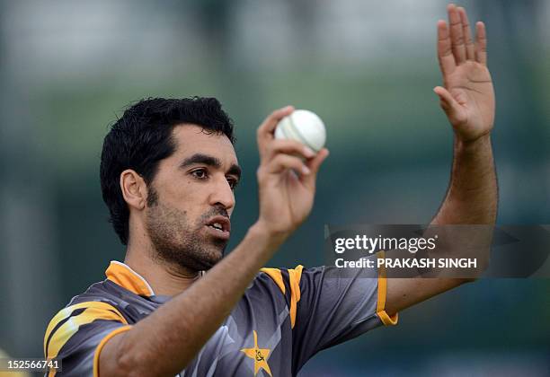 Pakistan cricketer Umar Gul bowls in the nets during a training session on the eve of the ICC Twenty20 Cricket World Cup match between Pakistan and...