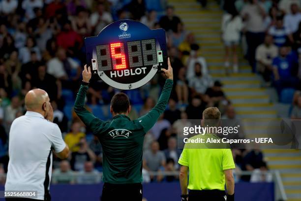 Referee show the Hublot Board with the 5 minutes extra time during the UEFA Under-21 Euro 2023 final match between England and Spain at Batumi Arena...