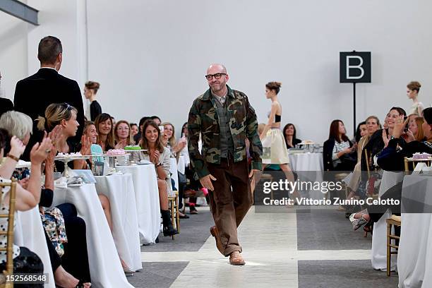 Fashion designer Antonio Marras on the runway after his Spring/Summer 2013 fashion show as part of Milan Womenswear Fashion Week on September 22,...