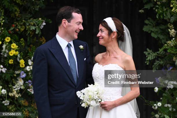 Former UK Chancellor George Osborne and Thea Rogers leave after their wedding at St Mary's Church, on July 8, 2023 in Bruton, England.