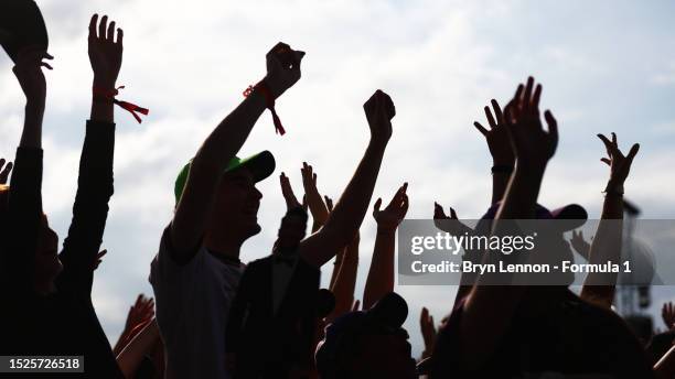 Crowd watches the fan stage after qualifying ahead of the F1 Grand Prix of Great Britain at Silverstone Circuit on July 08, 2023 in Northampton,...