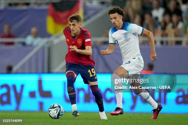Aimar Oroz of Spain being followed by Curtis Jones of England during the UEFA Under-21 Euro 2023 final match between England and Spain at Batumi...