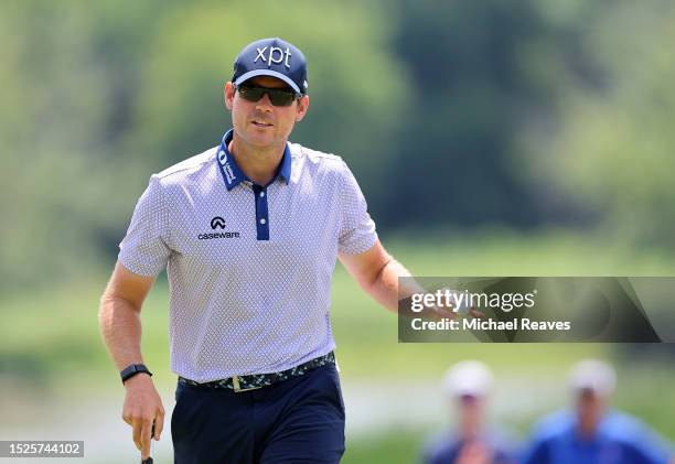 Adam Schenk of the United States reacts to eagle putt on the second green during the third round of the John Deere Classic at TPC Deere Run on July...