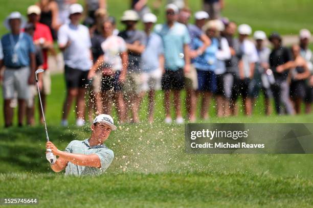 Garrick Higgo of South Africa plays a shot from a bunker on the second hole during the third round of the John Deere Classic at TPC Deere Run on July...