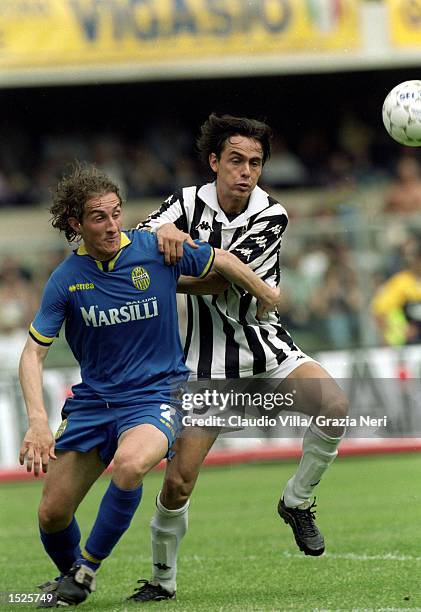 Aimo Diana of Verona holds off Filippo Inzaghi of Juventus during the Italian Serie A match at the Stadio Bentegodi in Verona, Italy. \ Mandatory...