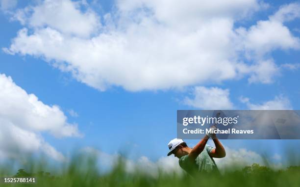 Garrick Higgo of South Africa plays his shot from the third tee during the third round of the John Deere Classic at TPC Deere Run on July 08, 2023 in...