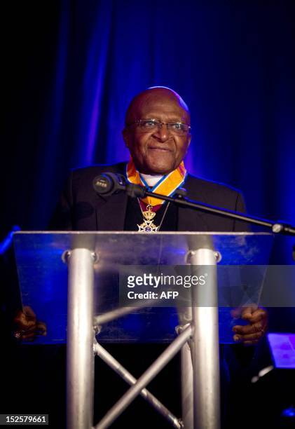 South African Archbishop Desmond Tutu speaks at a ceremony where he was honoured as Commander in the Order of Orange-Nassau in Bergkerk in Deventer,...