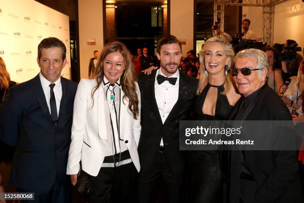 Kenneth Cole; Eva Cavalli; Martin Mica; Sharon Stone and Roberto Cavalli attend the amfAR Milano 2012 Cocktail reception during Milan Fashion Week at...