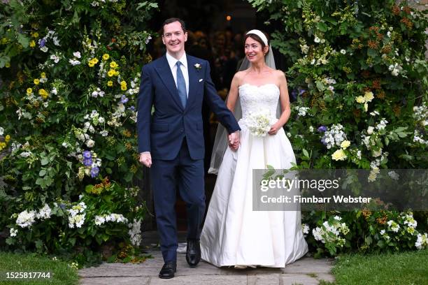 Former UK Chancellor George Osborne and Thea Rogers leave after their wedding at St Mary's Church, on July 8, 2023 in Bruton, England.