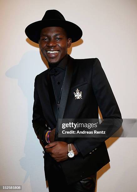 Theophilus London attends the amfAR Milano 2012 Cocktail reception during Milan Fashion Week at La Permanente on September 22, 2012 in Milan, Italy.