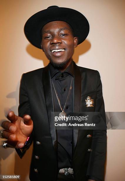 Theophilus London attends the amfAR Milano 2012 Cocktail reception during Milan Fashion Week at La Permanente on September 22, 2012 in Milan, Italy.