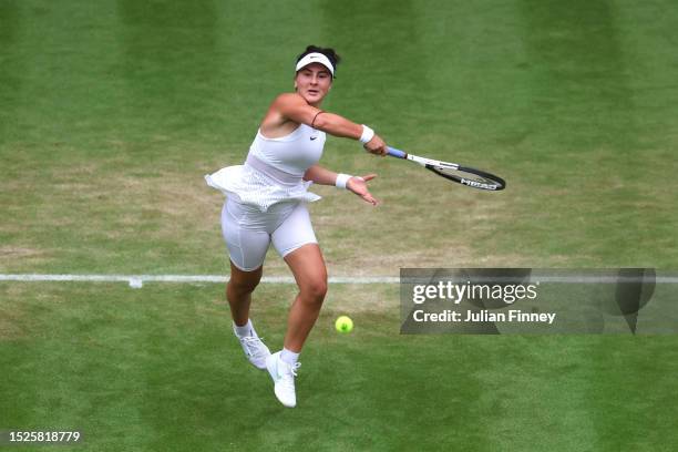 Bianca Andreescu of Canada plays a smash against Ons Jabeur of Tunisia in the Women's Singles third round match during day six of The Championships...