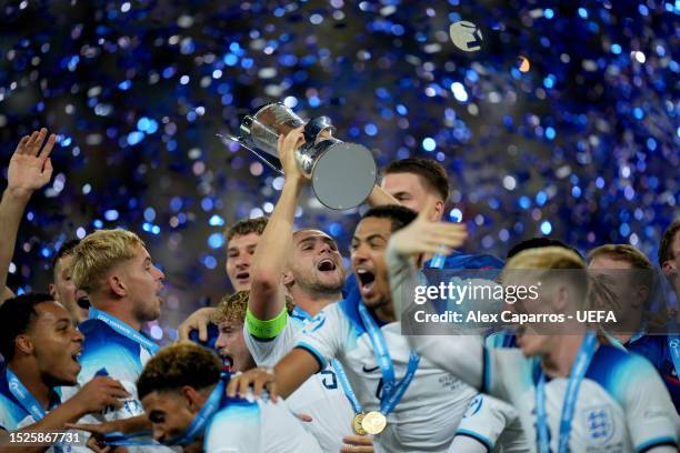 Taylor Harwood-Bellis of England lifts the Trophy after winning the UEFA Under-21 Euro 2023 final match between England and Spain at Batumi Arena on...