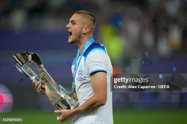 Taylor Harwood-Bellis of England lifts the Trophy after winning the UEFA Under-21 Euro 2023 final match between England and Spain at Batumi Arena on...