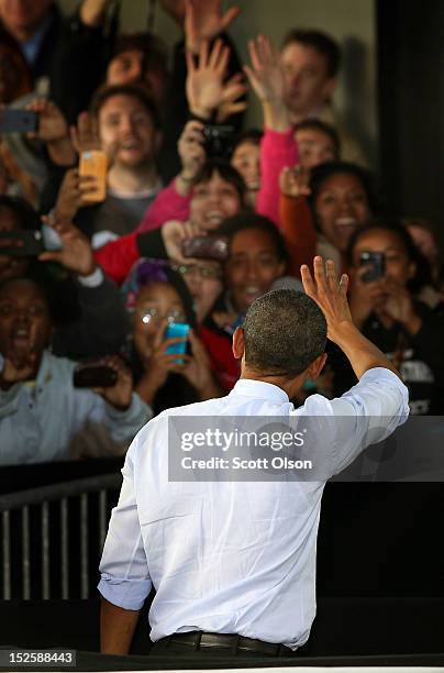 President Barack Obama leaves a campaign rally on September 22, 2012 in Milwaukee, Wisconsin. In addition to the rally, Obama attended two...