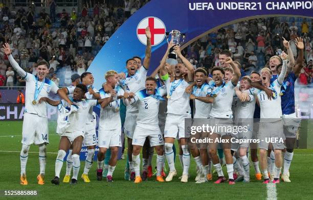 Taylor Harwood-Bellis of England lifts the Trophy after winning the UEFA Under-21 Euro 2023 final match between England and Spain at Batumi Arena on...