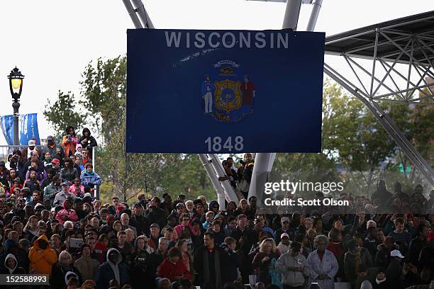 Supporters wait for U.S. President Barack Obama to arrive at a campaign rally on September 22, 2012 in Milwaukee, Wisconsin. In addition to the...