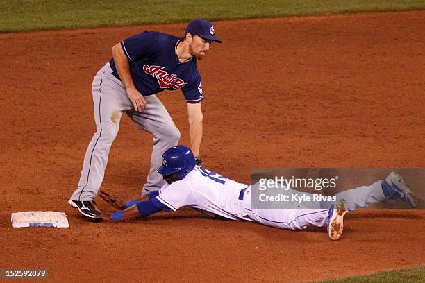 Irving Falu of the Kansas City Royals is tagged out by Cord Phelps of the Cleveland Indians in the seventh inning on September 22, 2012 at Kauffman...