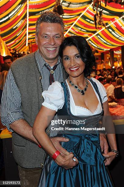 Juergen Hingsen and his girlfriend Francesca Elstermeier attend the Oktoberfest beer festival at Hippodrom on September 22, 2012 in Munich, Germany.