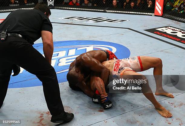 Jon ''Bones'' Jones defeats Vitor Belfort with an Americana submission during their light heavyweight championship bout at UFC 152 inside Air Canada...