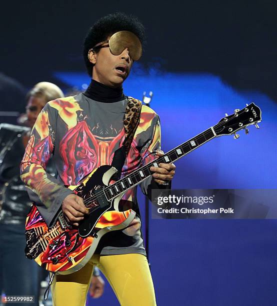 Recording artist Prince performs with singer Mary J. Blige onstage during the 2012 iHeartRadio Music Festival at the MGM Grand Garden Arena on...