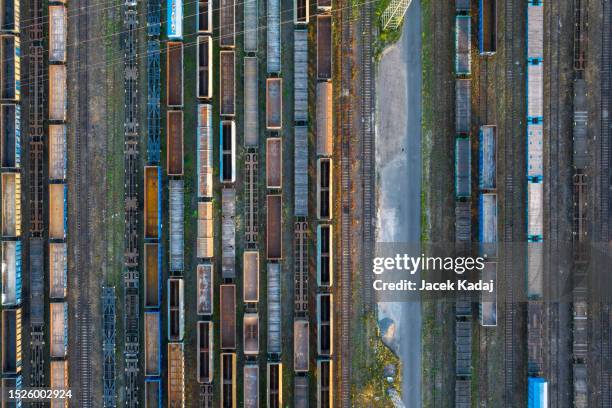 aerial view of rusty freight trains at the railway station. - railroad car stock-fotos und bilder
