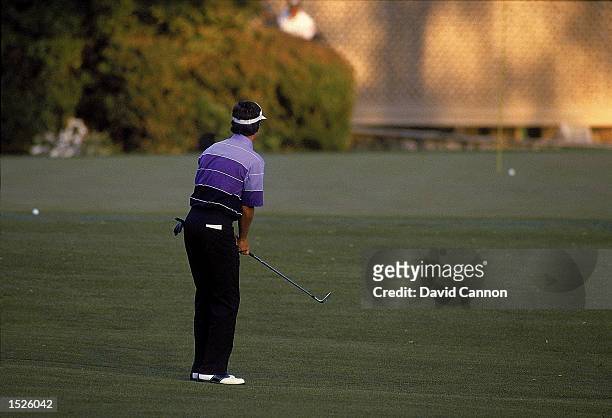 Larry Mize of the USA chips in on the second play-off hole number 11 to win the masters during the US Masters 1987 held at the Augusta National Golf...