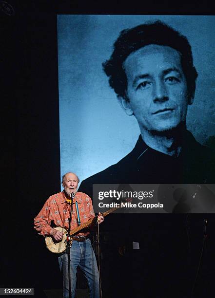 Singer Pete Seeger performs during the 'This Land Is Your Land' Woody Guthrie At 100 Concert as part of the Woody Guthrie Centennial Celebration at...