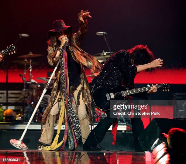 Singer Steven Tyler and guitarist Joe Perry of Aerosmith perform onstage during the 2012 iHeartRadio Music Festival at the MGM Grand Garden Arena on...