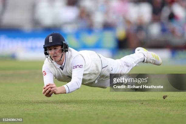 Harry Brook of England catches out Mitchell Starc of Australia during Day Three of the LV= Insurance Ashes 3rd Test Match between England and...