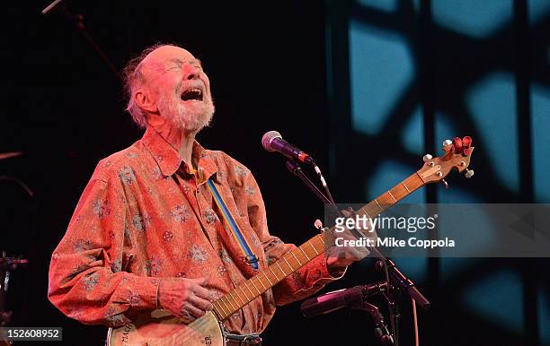 Singer Pete Seeger performs during the 'This Land Is Your Land' Woody Guthrie At 100 Concert as part of the Woody Guthrie Centennial Celebration at...