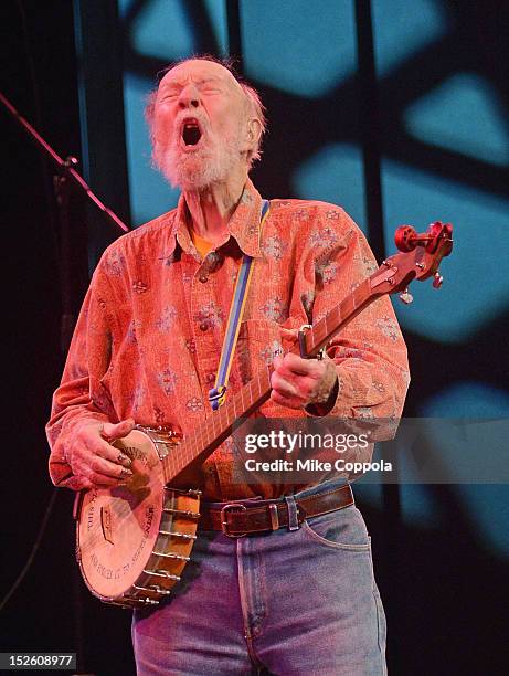 Singer Pete Seeger performs during the 'This Land Is Your Land' Woody Guthrie At 100 Concert as part of the Woody Guthrie Centennial Celebration at...