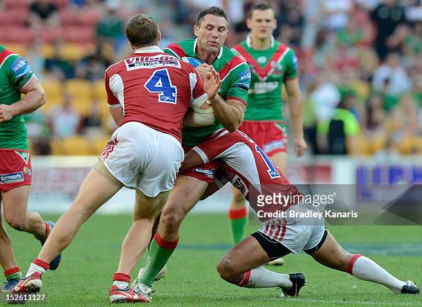 Dane Carlaw of the Seagulls takes on the defence during the Intrust Super Cup Grand Final match between the Wynnum Manly Seagulls and the Redcliffe...