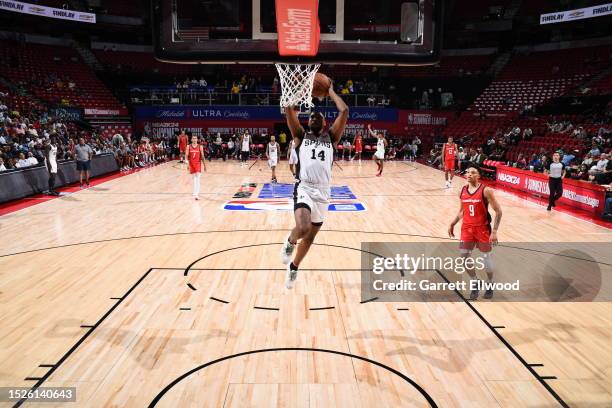 Blake Wesley of the San Antonio Spurs drives to the basket during the 2023 NBA Las Vegas Summer League against the Washington Wizards on July 11,...