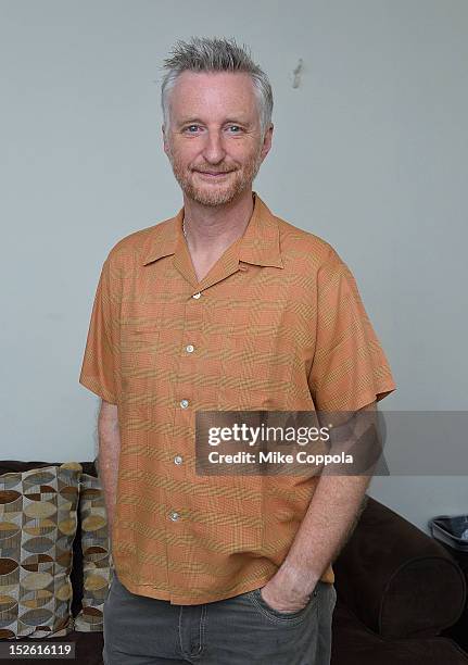 Musician Billy Bragg poses backstage at the 'This Land Is Your Land' Woody Guthrie At 100 Concert as part of the Woody Guthrie Centennial Celebration...