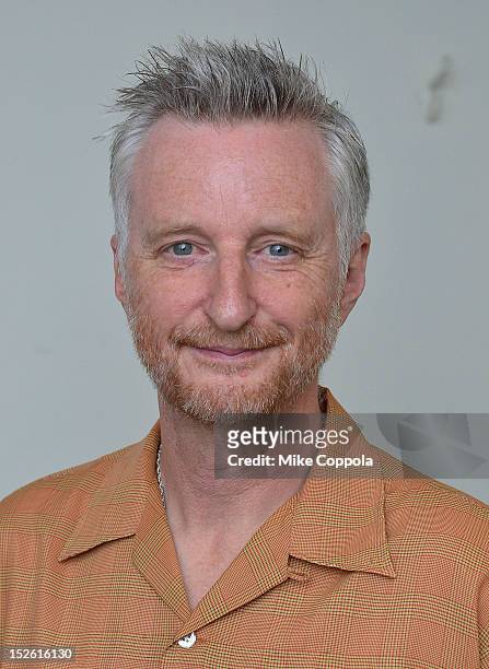 Musician Billy Bragg poses for a picture backstage at This Land Is Your Land - The Woody Guthrie Centennial Celebration at The Whitman Theater at...