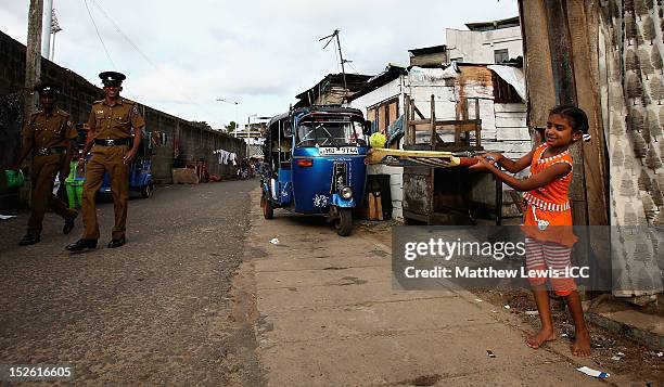 Local children play cricket on the streets outside the R. Premadasa Stadium ahead of the ICC World Twenty20 2012 Group A match between England and...