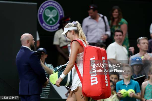 Katie Boulter of Great Britain leaves the court following her defeat to Elena Rybakina of Kazakhstan in the Women's Singles third round match during...