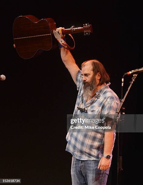 Singer/songwriter Steve Earle performs during the 'This Land Is Your Land' Woody Guthrie At 100 Concert as part of the Woody Guthrie Centennial...