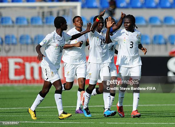 Jane Ayieyam of Ghana celebrates scoring a goal with her team mates during the FIFA U-17 Women's World Cup 2012 group D match between Ghana and...